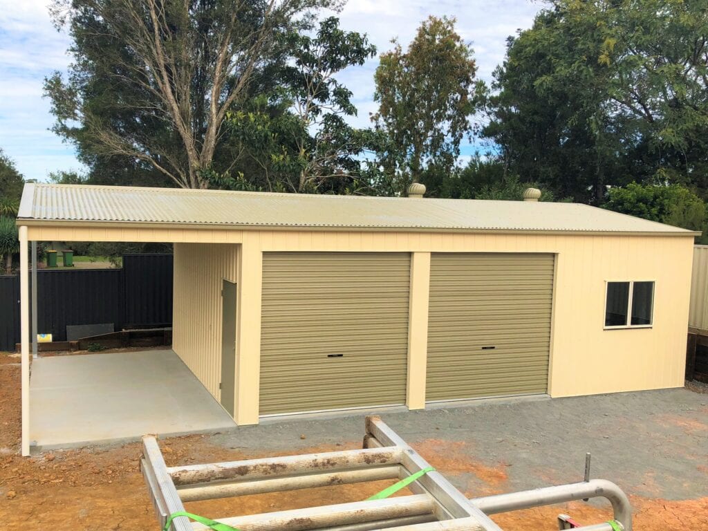 Gable roof shed with roller door = Colorbond "Classic Cream"