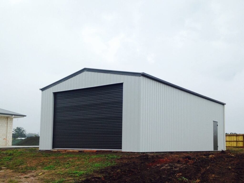 Gable roof shed with roller door = Colorbond "Shale Grey Matt"