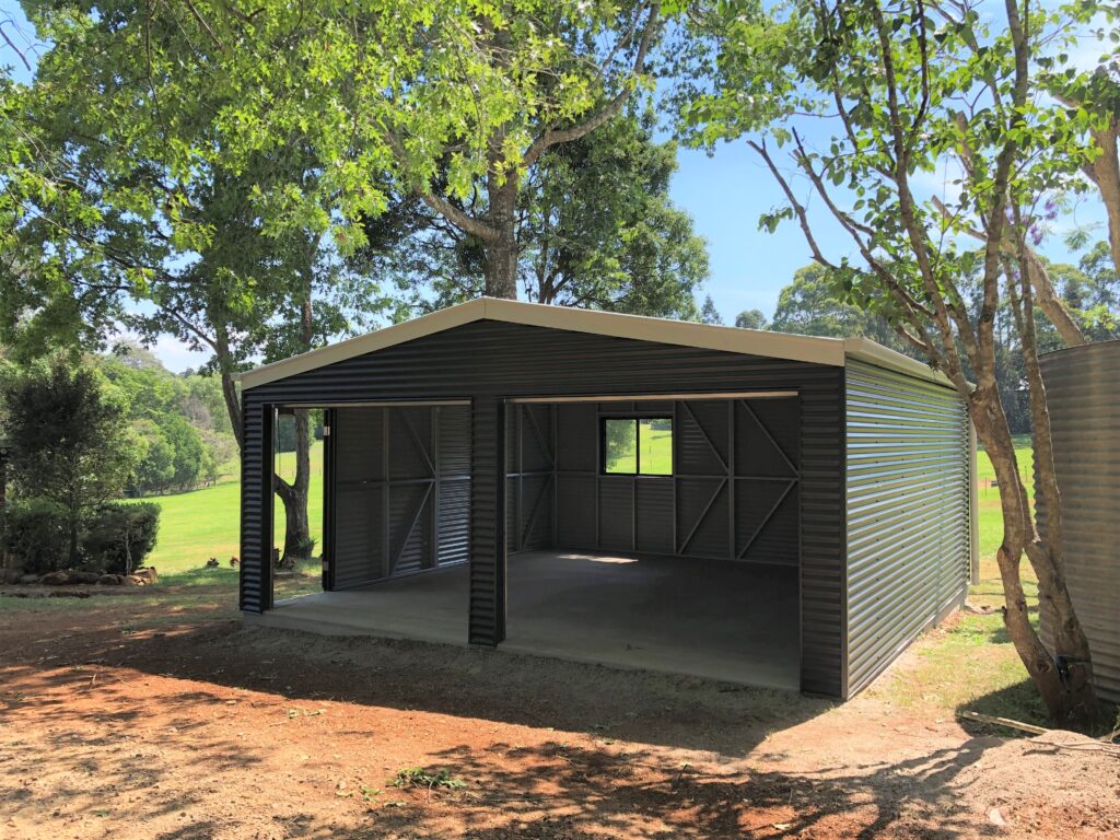 Gable roof shed with two roller doors = Colorbond "Pale Eucalypt"
